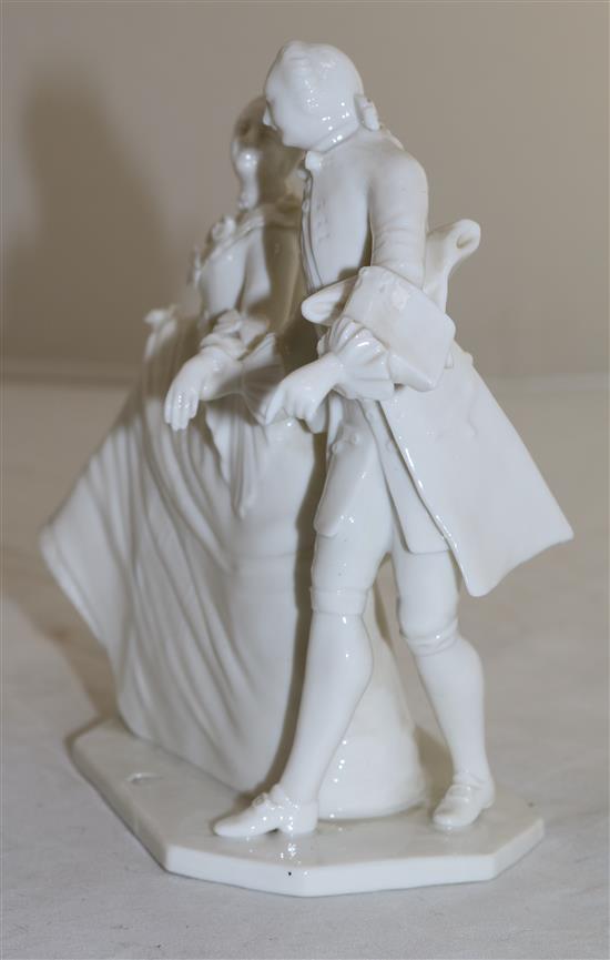 A Nymphenburg white glazed porcelain group of a lady and gentleman, after Bustelli, late 20th century, height 15.5cm (6.1in.)